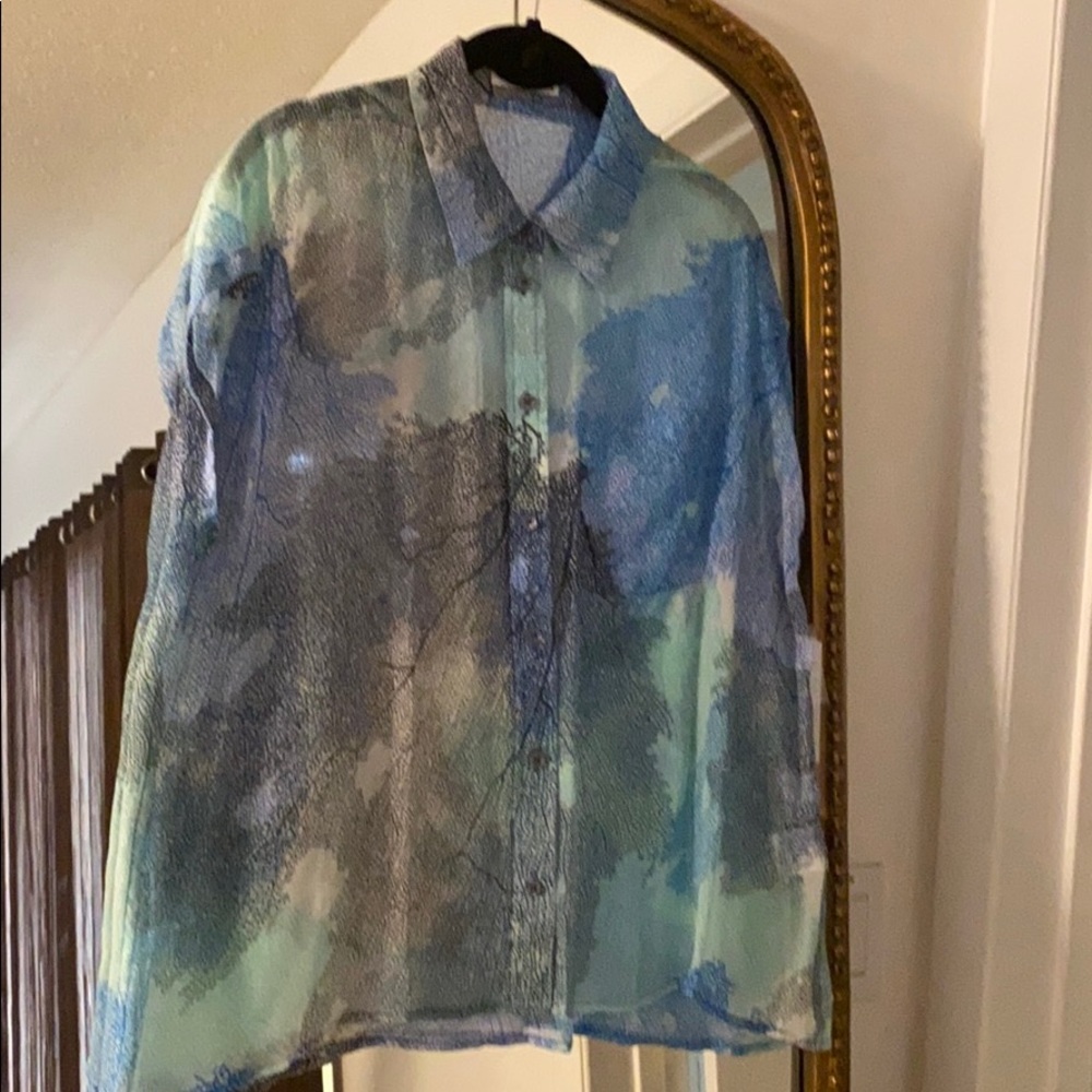 Sleeveless Equipment top size M..